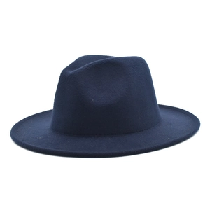 Detail view of the navy blue wool fedora hat with a classic pinched crown design