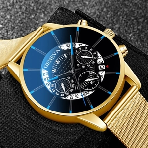 Detailed close-up of a gold mesh band Geneva watch with a black dial and blue markers