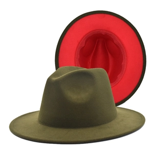Detailed view of bicolor fedora hat featuring olive green exterior and vibrant red lining