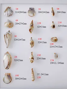 Size chart for gold-edged shell pendants showing diverse dimensions and design codes