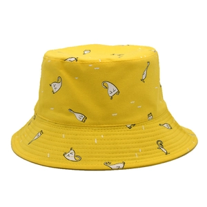 Yellow canvas bucket hat with white cartoon graphics and protective stitched brim