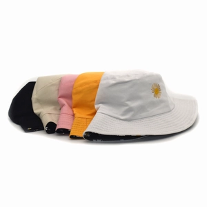 Detail of five reversible cotton bucket hats with daisy embroidery and floral lining