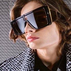 Steampunk oversized square sunglasses with black frame and gold metal side accents
