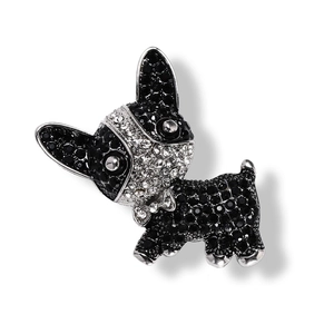 Detailed macro shot of French Bulldog brooch with black and white rhinestones