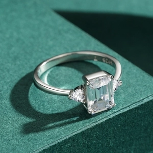 S925 sterling silver ring with emerald cut cubic zirconia and trillion side stones