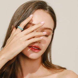 Elegant S925 sterling silver ring with turquoise stones worn on hand for a stylish look