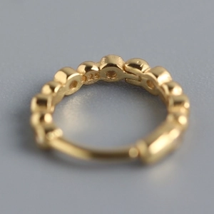 Minimalist gold S925 sterling silver beaded hoop earring featuring a 925 hallmark