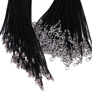 Bulk display of black wax cord necklace cords with silver lobster clasps and extension chains