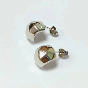 Modern irregular geometric stainless steel stud earrings with polished silver finish
