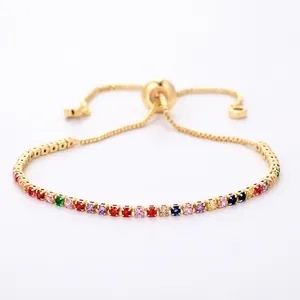 Adjustable gold bracelet with colorful row of cubic zirconia stones and slide clasp