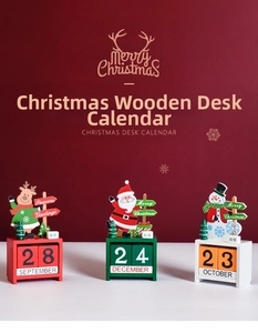 Detail of three festive wooden Christmas countdown calendars with Santa, deer and snowman