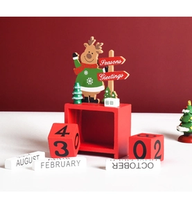 Close-up of wooden Christmas advent calendar with reindeer motif and date blocks