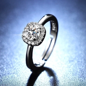 Adjustable S925 sterling silver ring with a sparkling halo set round moissanite stone