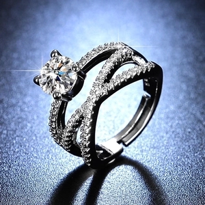 Macro shot of S925 sterling silver ring showing detailed six-prong setting and hallmark