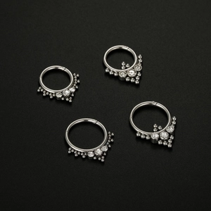316L surgical steel septum rings with zircon stones and bead accents in silver finish