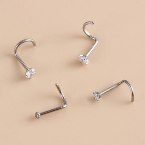 G23 titanium nose studs with clear cubic zirconia crystals in S-shape and L-shape designs
