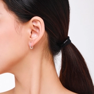 Minimalist s925 silver geometric hoop earrings for women shown on model side profile