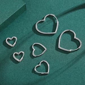 Three pairs of S925 sterling silver heart-shaped hoop earrings in various sizes