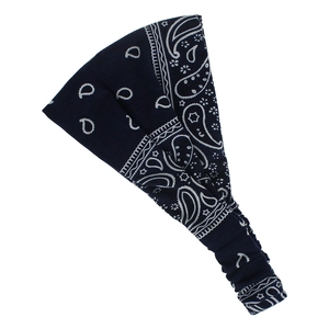 Detail of dark blue paisley print elastic headband with intricate floral patterns