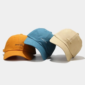 Three cotton baseball caps in yellow blue and beige with CRUISE embroidery detail