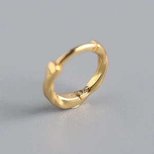 Elegant 925 sterling silver gold plated hoop earring with twisted wave texture
