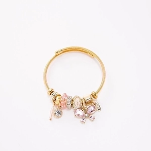 Gold wire cable bracelet featuring pink crystal butterfly and CZ charms for women