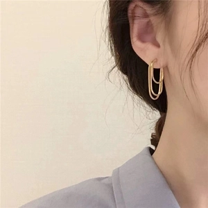 Elegant gold minimalist triple-hoop earrings featuring a geometric layered design for women