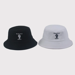 Black and white cotton bucket hats with Black Lives Matter embroidery and fist symbol