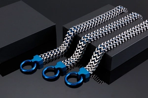 Close-up of industrial silver and sapphire blue woven stainless steel dragon bone bracelet