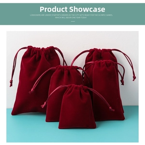 Multiple sizes of burgundy velvet drawstring gift bags displayed on a blue-white background