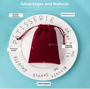 Close-up of burgundy velvet jewelry pouch with drawstring and durable reinforced bottom