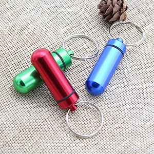 Portable waterproof aluminum alloy pill bottle keychain in red, green and blue colors