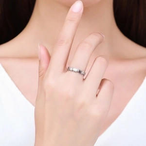 925 silver geometric maze ring with zircon stones shown on female model finger