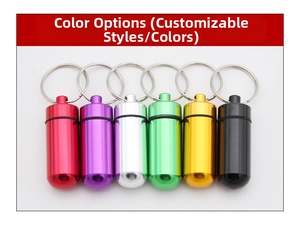 Detailed view of six colors of portable aluminum capsule pill boxes with keychains