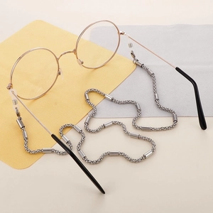 Silver beaded stainless steel glasses chain with clear silicone grips on eyewear