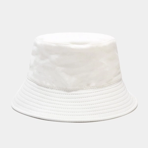 Close-up of white cotton bucket hat featuring reinforced brim stitching and clean finish