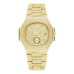Detailed close-up of gold iced-out men's quartz watch with crystal-encrusted octagonal bezel