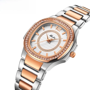 Luxury gold tonneau-shaped women watch with diamond-set bezel and two-tone steel bracelet