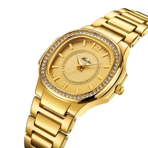 Detailed view of square gold watch with diamond bezel and metallic chain strap