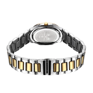 Close-up of stainless steel watch back with water resistant engraving and metal band