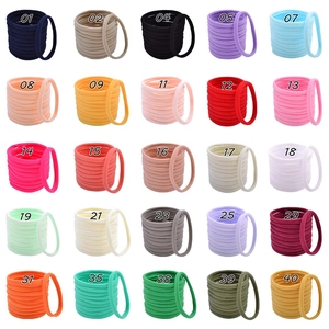 Detailed grid showing 25 colors of high-elastic nylon seamless hair ties for kids