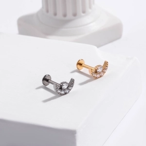 G23 titanium crescent moon push-pin studs with inlaid zircons in gold and silver