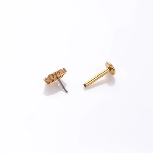 G23 titanium labret stud with zircon moon design and flat back pin shown on white background