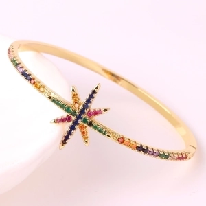 18k gold plated rainbow bracelet with colorful starburst charms and cubic zirconia stones
