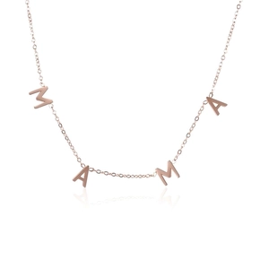 Detailed view of the rose gold MAMA letter pendant on a delicate cross chain