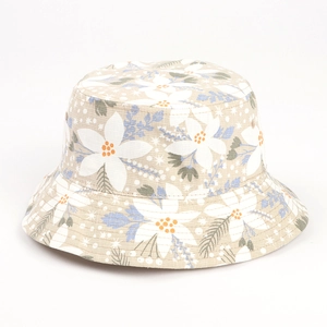Detail of leaf pattern bucket hat showing linen texture and reinforced brim stitching