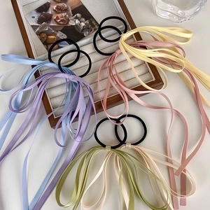 Elegant long satin ribbon hair ties with colorful bows for ponytail styling