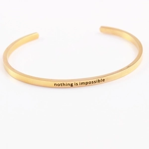 Adjustable gold stainless steel mantra bracelet with Nothing is Impossible engraving