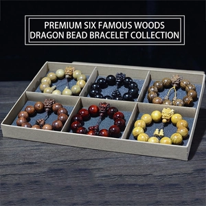 Coffret de six bracelets en bois naturel précieux avec perles de dragon sculptées