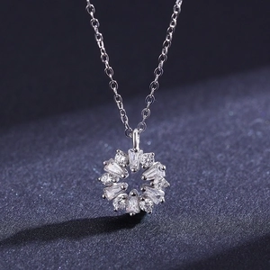 S925 sterling silver flower necklace featuring radiant white baguette-cut stones on dark background